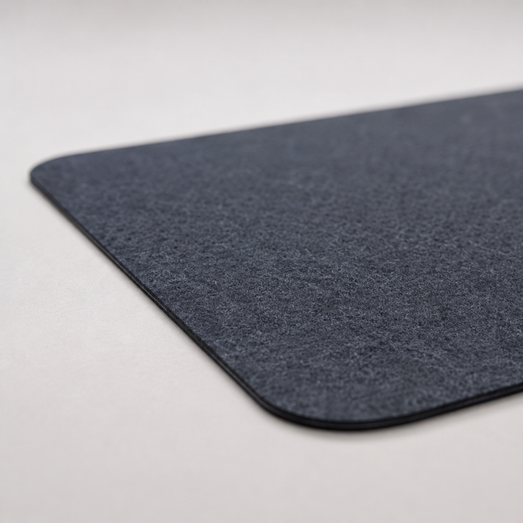 Rounded corner and edge detail of The Felt Desk Mat